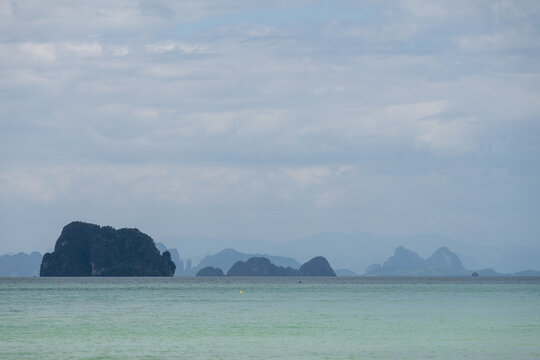 Cloudy seascape with limestone islands at Krabi Thailand