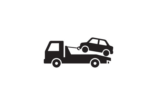 Tow truck lifting damaged car from road recovery vehicle transporting automobile help service assistance vehicle accident breakdown assistance.