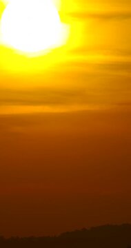 Vertical video Timelapse sunset in the mountains