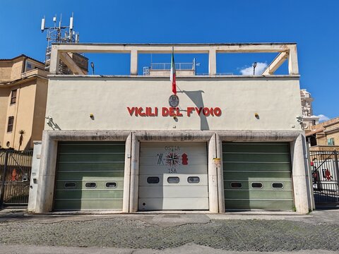 Ostia, Rome, Italy - March 12, 2026, perspective view of the facade of the historic building, with the red sign, which houses the Fire Brigade Station.