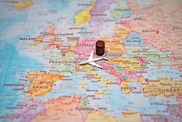 Naklejka premium Airplane and fuel barrel on a map of Europe.
