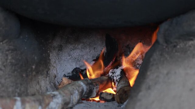Wood burning in a traditional clay oven