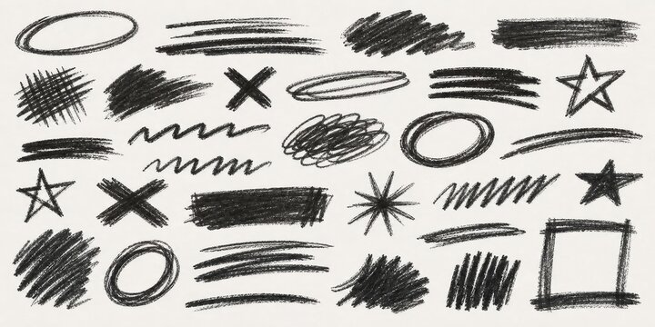 Collection of diverse charcoal scribbles, brush strokes, asterisks, crosses, and oval shapes