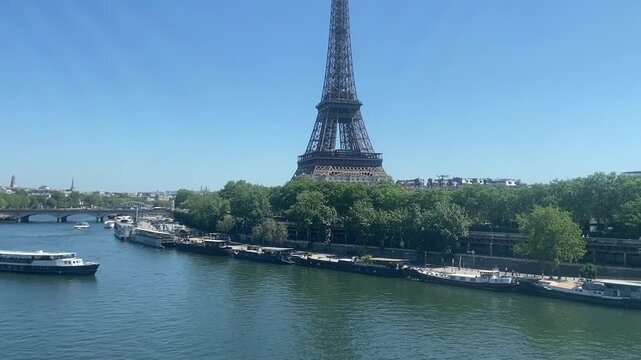 Eiffel tower in paris, traveling view from metro line bridge
