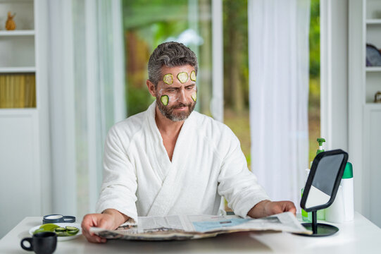 Facial mask of cucumber. Cosmetic procedure man with cucumber slices mask on face. Hispanic man with facial cucumber mask. Benefits of vitamin C. Man applying facial mask with cucumber. Calm routine