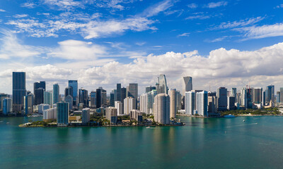 Obraz premium Miami skyline with modern skyscrapers. Miami cityscape from drone view. Miami waterfront panorama with buildings. Miami urban skyline with offices.