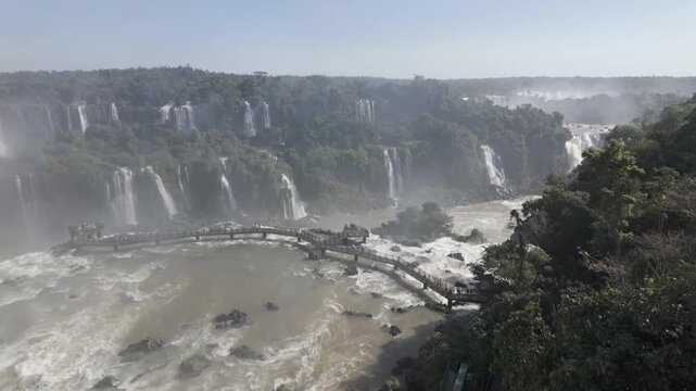 River flowing downstream viewed from elevated observation platform footage