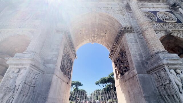 Ancient Arch of Constantine with carved reliefs and statues in Rome