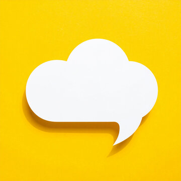 Blank notification message pop-up in speech cloud shape, vivid yellow background, modern UI design, mockup, minimal composition. Close-up.