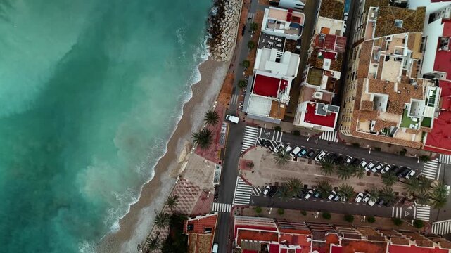 Top down aerial view of waterfront houses and promenade, Javea, Spain
