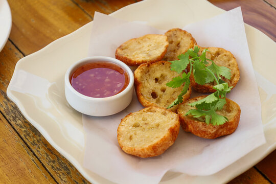 Basreng or baso goreng or fried meat ball with chili sauce.