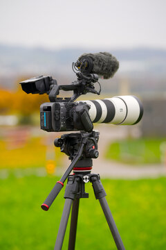 Sony FX-6 video camera on Manfrotto tripod with Deity microphone airplane spotter equipment at village of Oberglatt on an autumn day. Photo taken November 10th, 2025, Zurich Oberglatt, Switzerland.