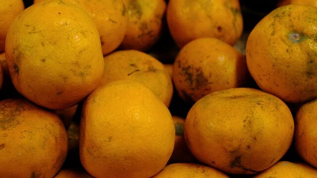 Indonesian Orange Tangerine Close-Up at Jakarta Market - Natural Imperfect Citrus Fruit Footage