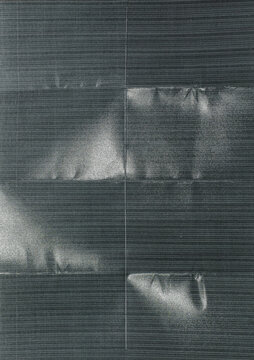 close-up of photo paper featuring a fine horizontal line pattern, visible fold creases, and soft reflective highlights that reveal the depth and texture of the material.
