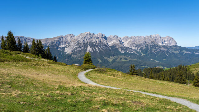 Wilder Kaiser mountain panorama with hiking trail in Austria