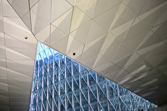 Geneva, Switzerland, Europe :  05.2026 : Japan International Tobacco (JIT) - futuristic headquarters building with self-shading glass facade