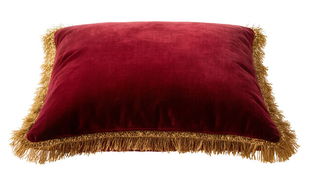 Plush deep red velvet rectangular cushion with gold fringe trim, isolated on transparent background