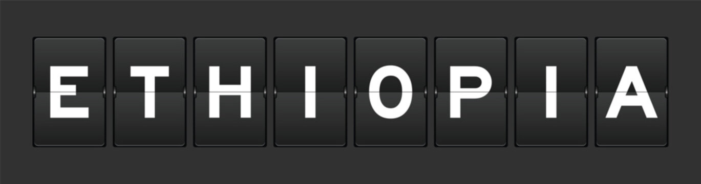 Black color analog flip board with word ethiopia on gray background
