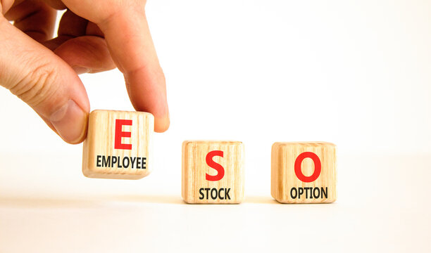 ESO employee stock option symbol. Concept words ESO employee stock option on beautiful wooden blocks. Beautiful white background. Business ESO employee stock option concept. Copy space.