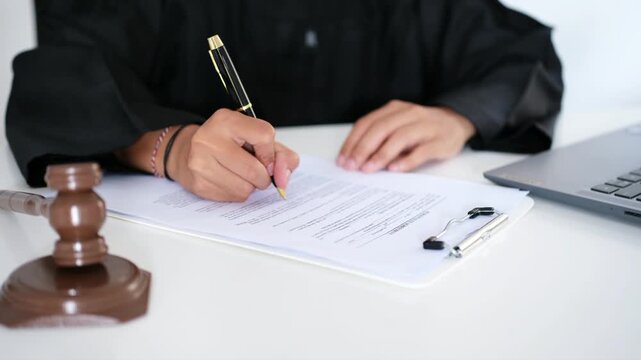Lawyers or advocates signing consent documents, concepts of justice, corporations, justice and rights, insurance, courts and authorities. World Justice Day
