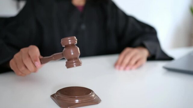 The judge bangs the gavel. The determination of law and the court