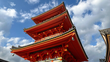 Fototapeta premium Traditional Japanese Pagoda Temple Against Blue Sky – Historic Asian Architecture Landmark