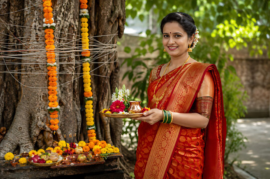 Indian women celebrating Vat Savitri Vrat, Vat Purnima (Pournima), Savitri Amavasya, Bargad Pooja, and the Banyan Tree Festival.