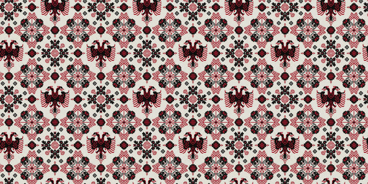 Traditional albanian double-headed eagle and floral seamless pattern with red and black motifs