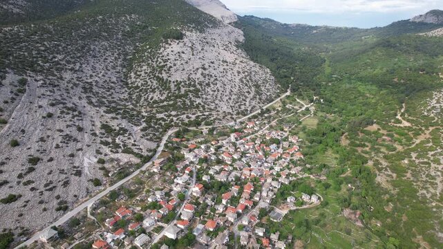 Epc aerial view of Theologos village inside majestic mountain canyon in Thassos Greece