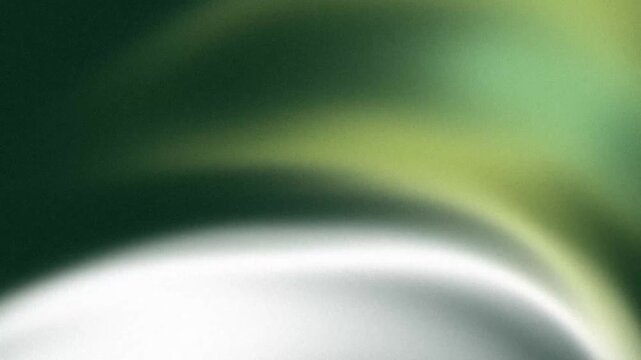 Abstract grainy green gradient flows shifting across a dark organic canvas with soft mossy lighting and vintage film texture aesthetic