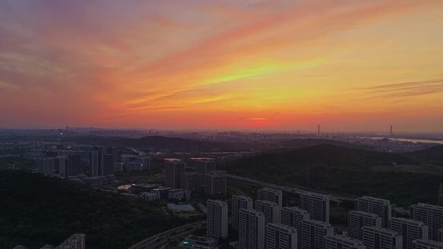 Aerial photography of urban landscapes and city skylines at sunset.