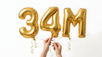 Naklejka premium Golden balloons forming 34m on white background