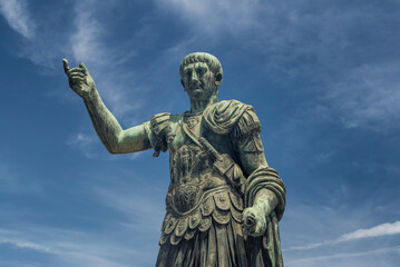 Fototapeta premium A patina statue of emperor Caesar Nerva Traiano in Rome Italy