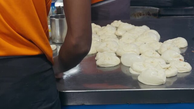Traditional Indian Parotta Dough Balls Arranged On Kitchen Preparation Table