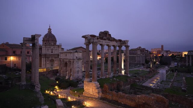Roman Forum at Sunset as Lights Turn On. Dusk, Night From Famous Viewpoint. Pillars and Ancient Architecture in Rome, Italy.