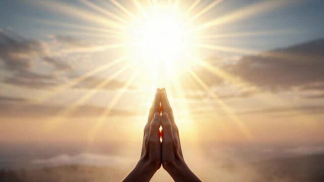 Serene sunrise with clasped hands in prayer symbolizing peace spirituality and hope