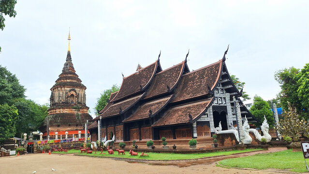The majestic and ancient brick chedi of Wat Lok Moli temple, a historical Lanna-style monument nestled in the heart of Chiang Mai, Thailand, showcasing exquisite traditional craftsmanship.