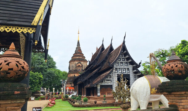 The majestic and ancient brick chedi of Wat Lok Moli temple, a historical Lanna-style monument nestled in the heart of Chiang Mai, Thailand, showcasing exquisite traditional craftsmanship.