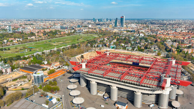 Aerial drone view of San Siro stadium, AC Milan and Inter Milan, iconic cylindrical towers, Stadio Giuseppe Meazza, Milan, Italy