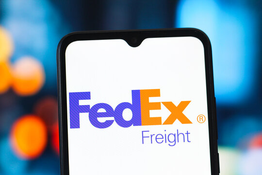 In this photo illustration, the FedEx Freight logo is seen displayed on a smartphone screen.