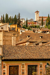 Fototapeta premium Spain. Granada. Historical streets of Spanish Granada. The Alhambra Palace complex. Beautiful Spanish city. Travel, Tourism 