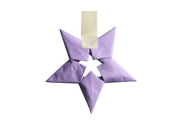 Obraz premium Purple origami star adorned with tape for festive decoration on a transparent background.