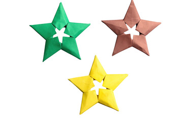 Obraz premium Green red and yellow origami stars arranged in group isolated on transparent background festive decorations.