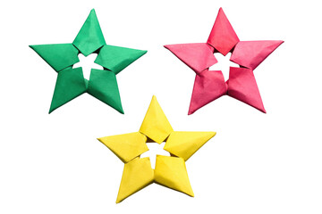 Obraz premium Green red and yellow origami stars together on transparent background festive craft objects for decoration.