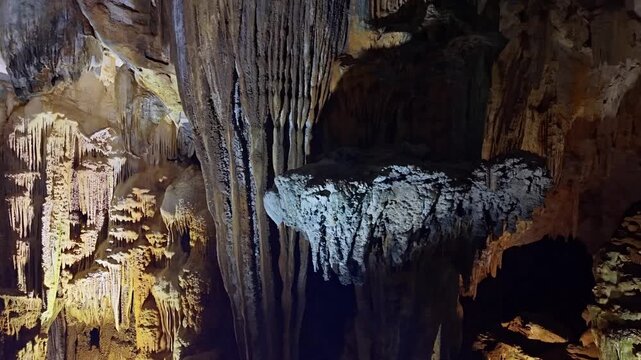 Lighting Reveals Mineral Layer Textures. Cavern Illuminates Textured Rock and Cave Mineral Layers