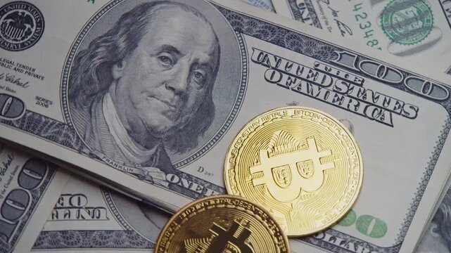 Discover how cash and cryptocurrency come together, showcasing unique coins atop a backdrop of American dollars, reflecting a modern financial exchange