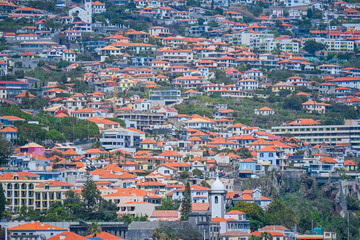 Obraz premium Madeira, Portugal, 30.05.2026: Panoramic View of Funchal City and Cruise Port from a Hillside Viewpoint