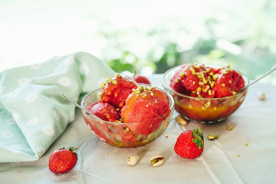 Strawberry sorbet dessert with copy space for text. Summer food background and refreshing fruit dessert concept