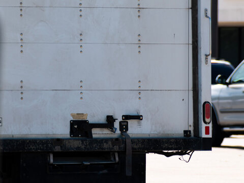 White box truck from an unclose perspective.