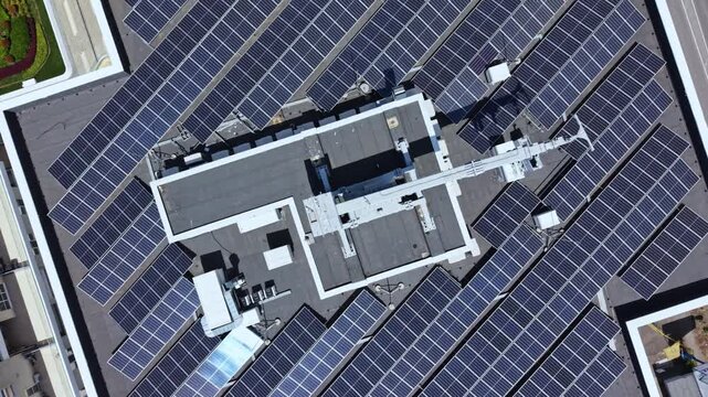 Solar panels fill the rooftop space, capturing sunlight and converting it into energy. This setup demonstrates the use of renewable resources to support the environment.